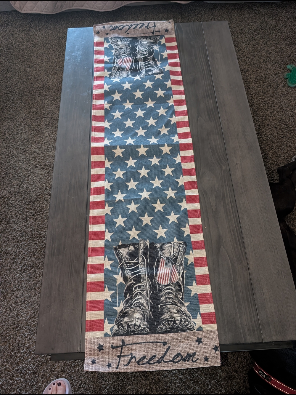 Patriotic Freedom table runner features a rustic design with star-spangled boots
